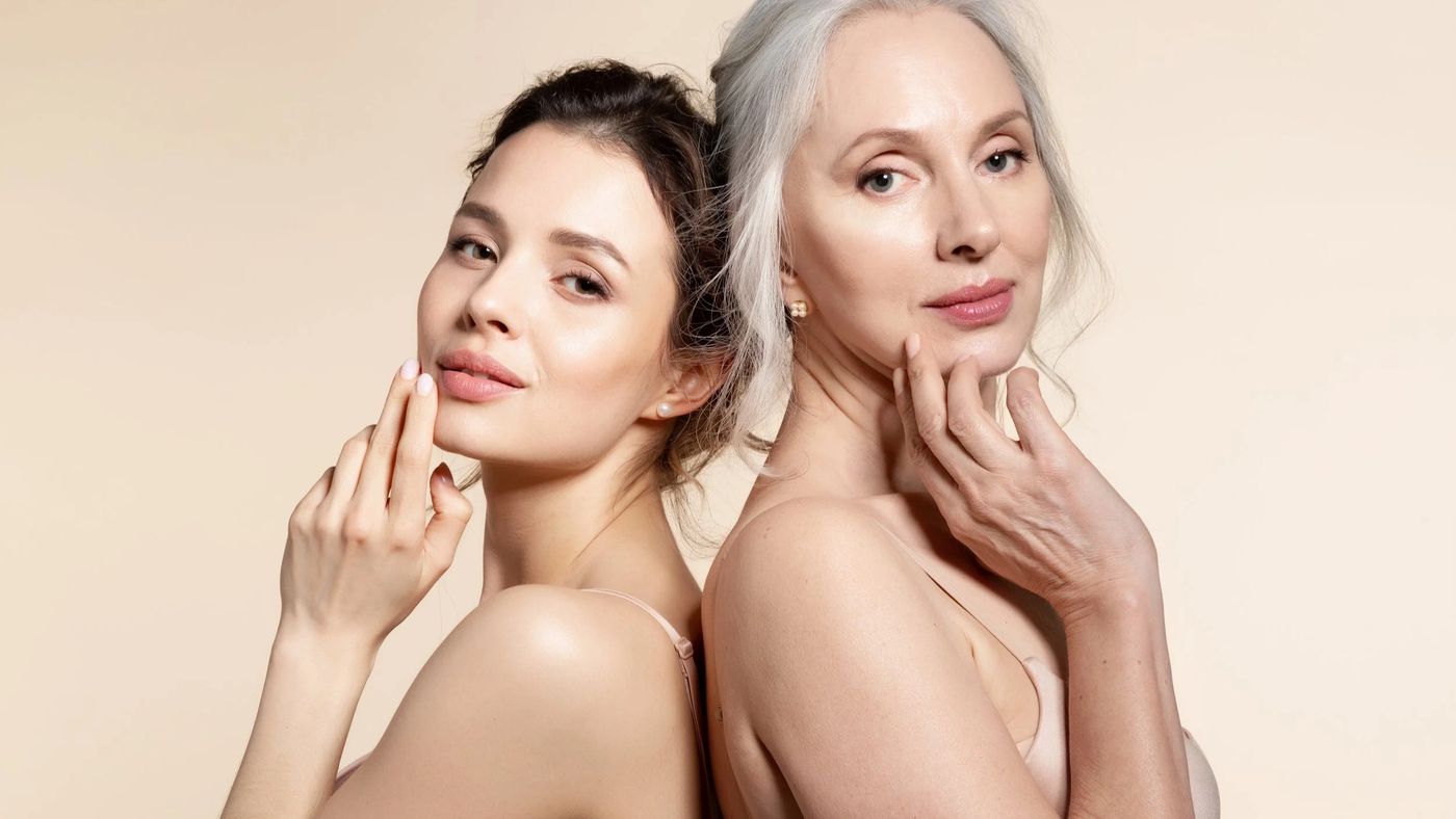 Two women of different ages with natural skin